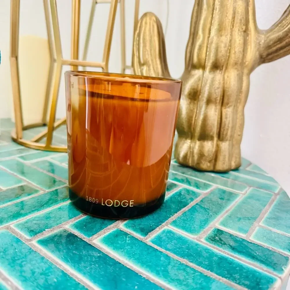 NEW FP FREE PEOPLE Amber Rust Glass Vessel Lodge Palo Santo $48 Scented Candle
